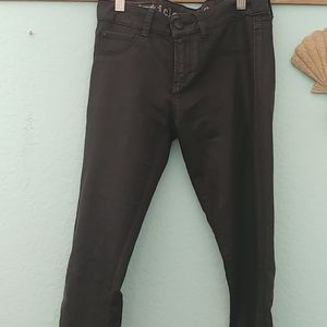 Black waxed denim jeans